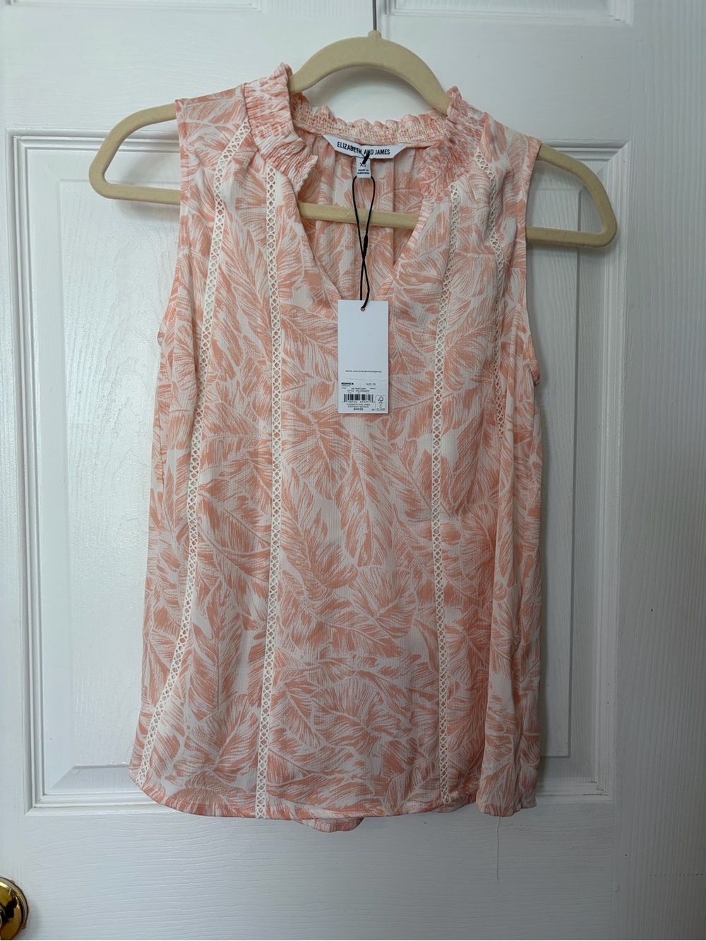 Elizabeth and James Sleeveless Ruffled Neck Floral Print Top in Light Peach
